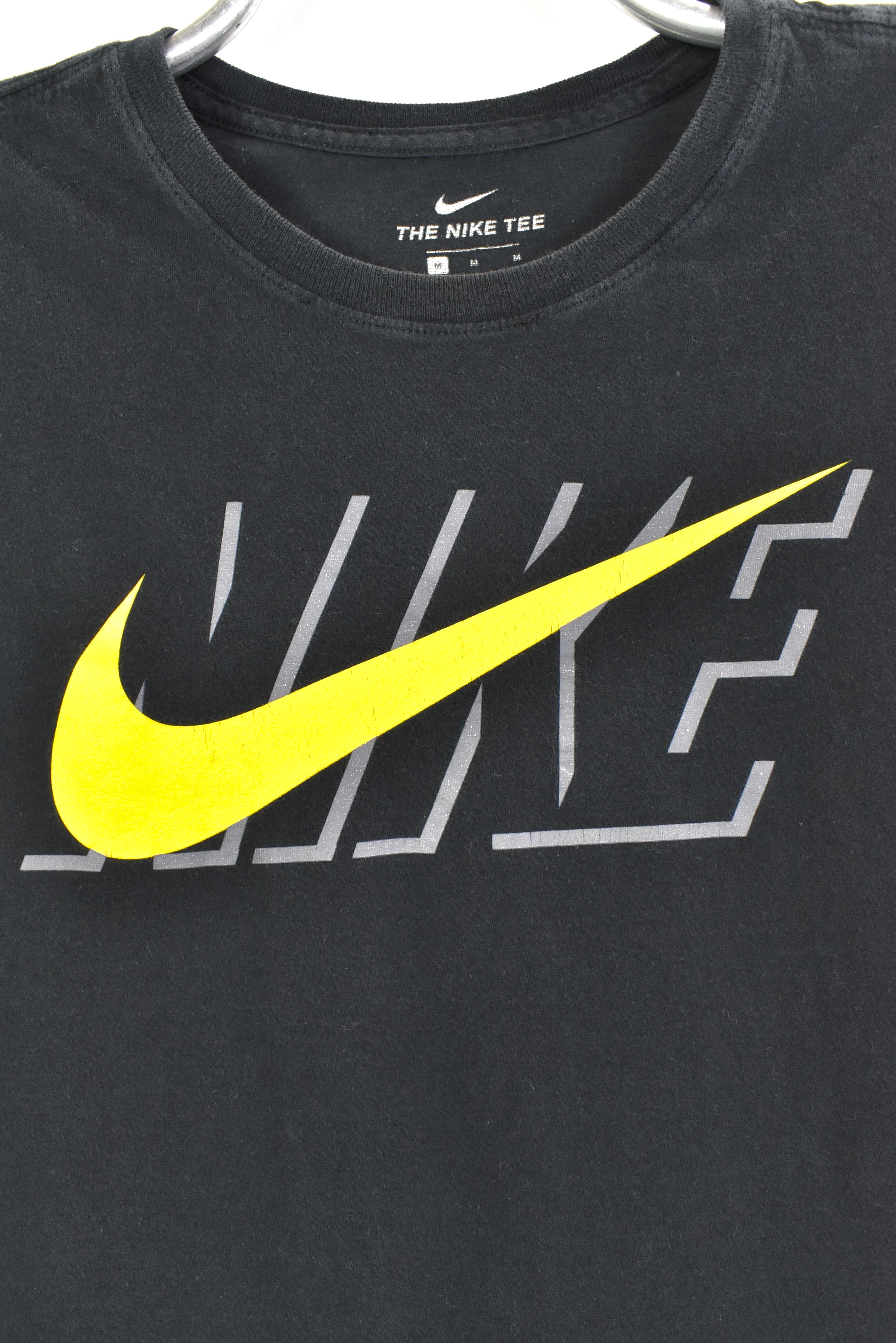 Women's modern Nike shirt, short sleeve black graphic tee - medium NIKE