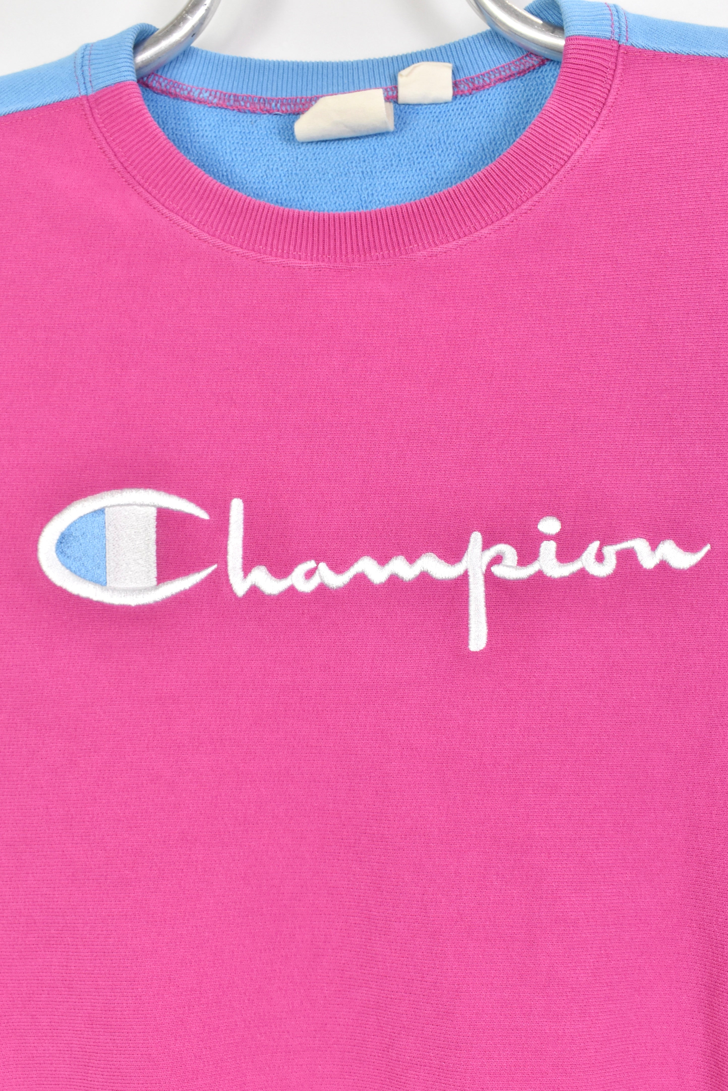 Vintage Women's Champion embroidered pink sweatshirt | Medium CHAMPION