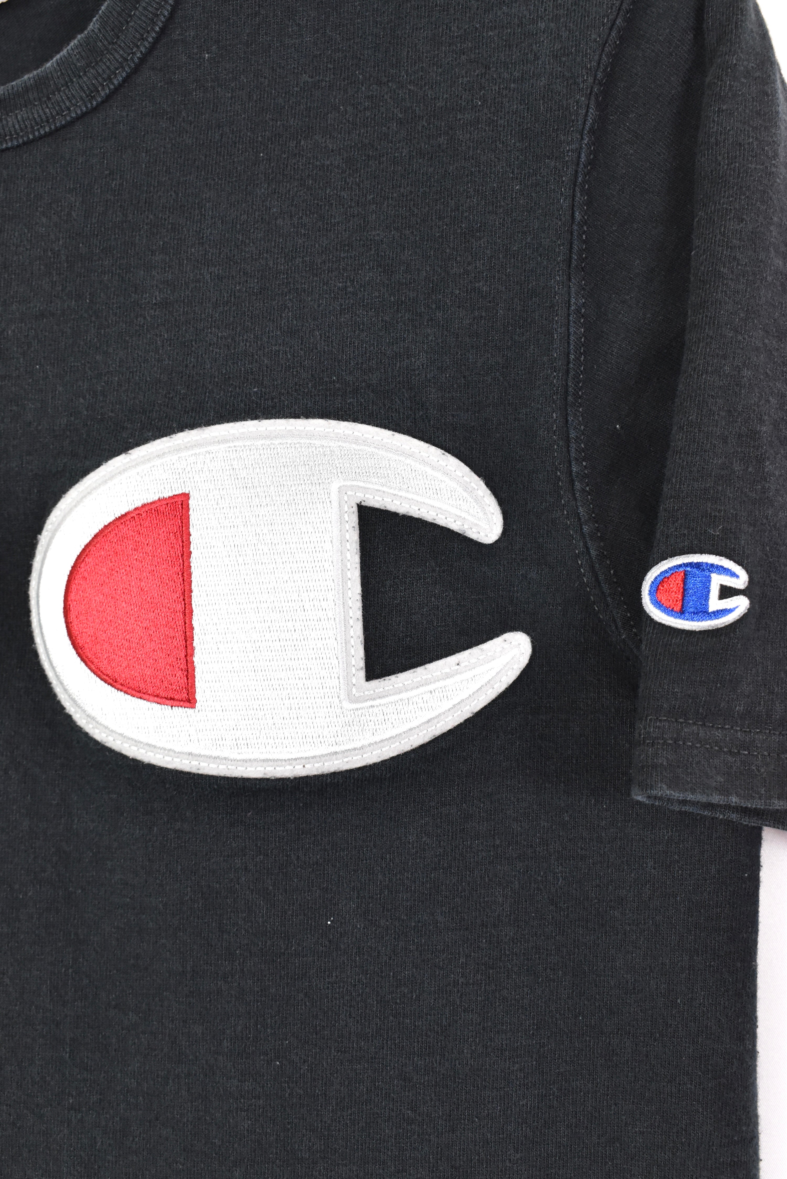 Vintage Women's Champion black t-shirt | Small CHAMPION