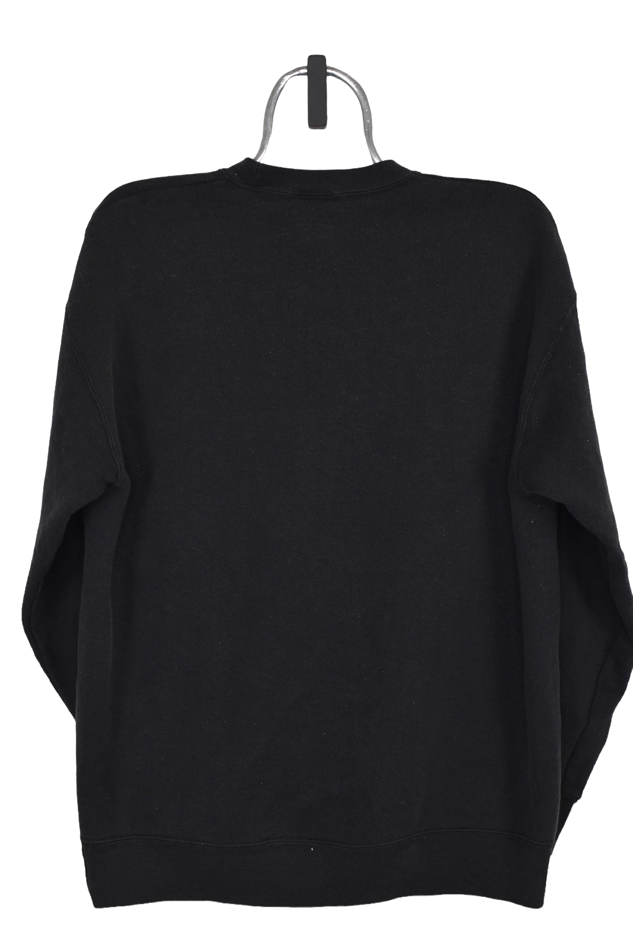 Vintage Oakland Raiders sweatshirt (L), black NFL embroidered crewneck