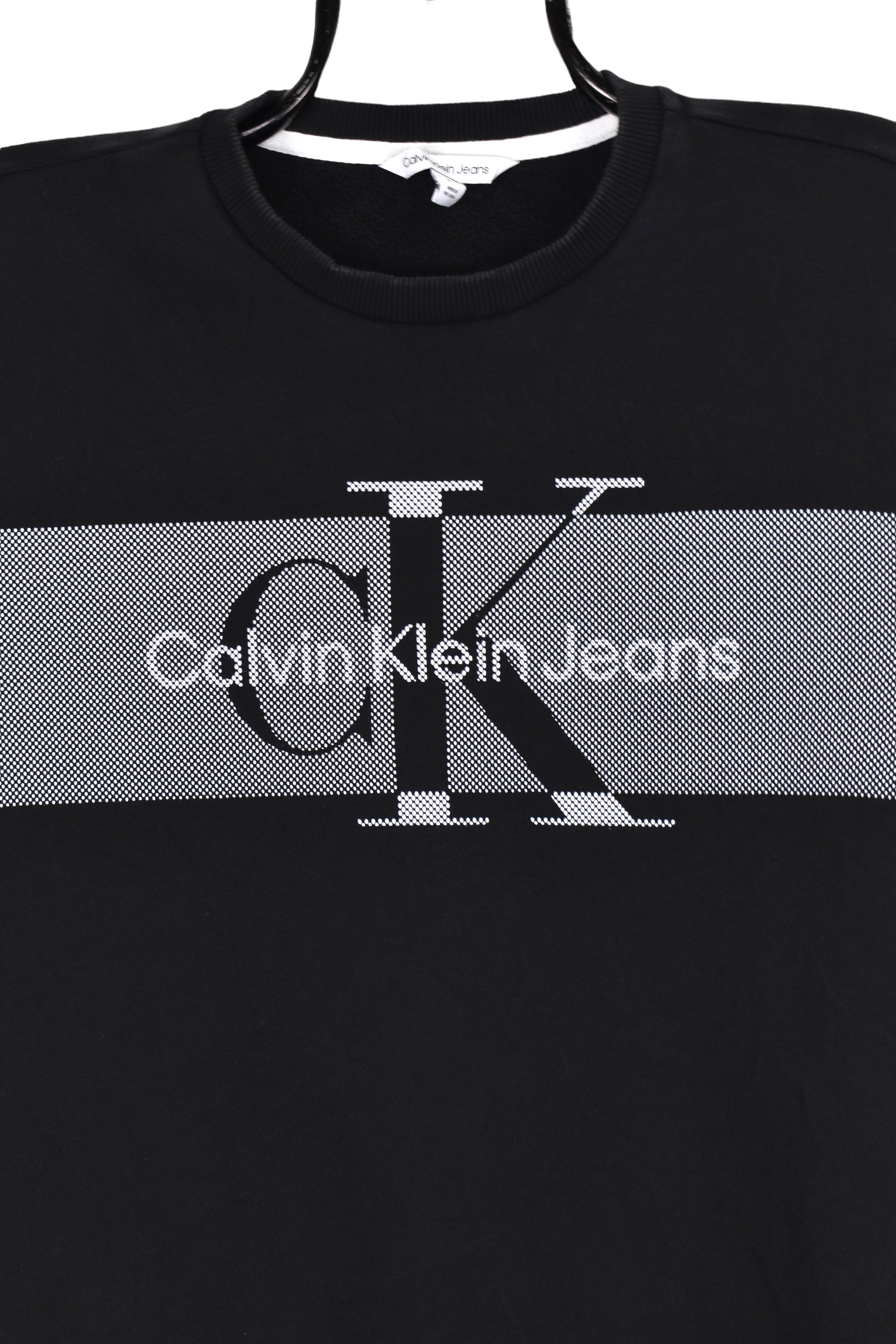 Modern Calvin Klein sweatshirt (M), black graphic crewneck