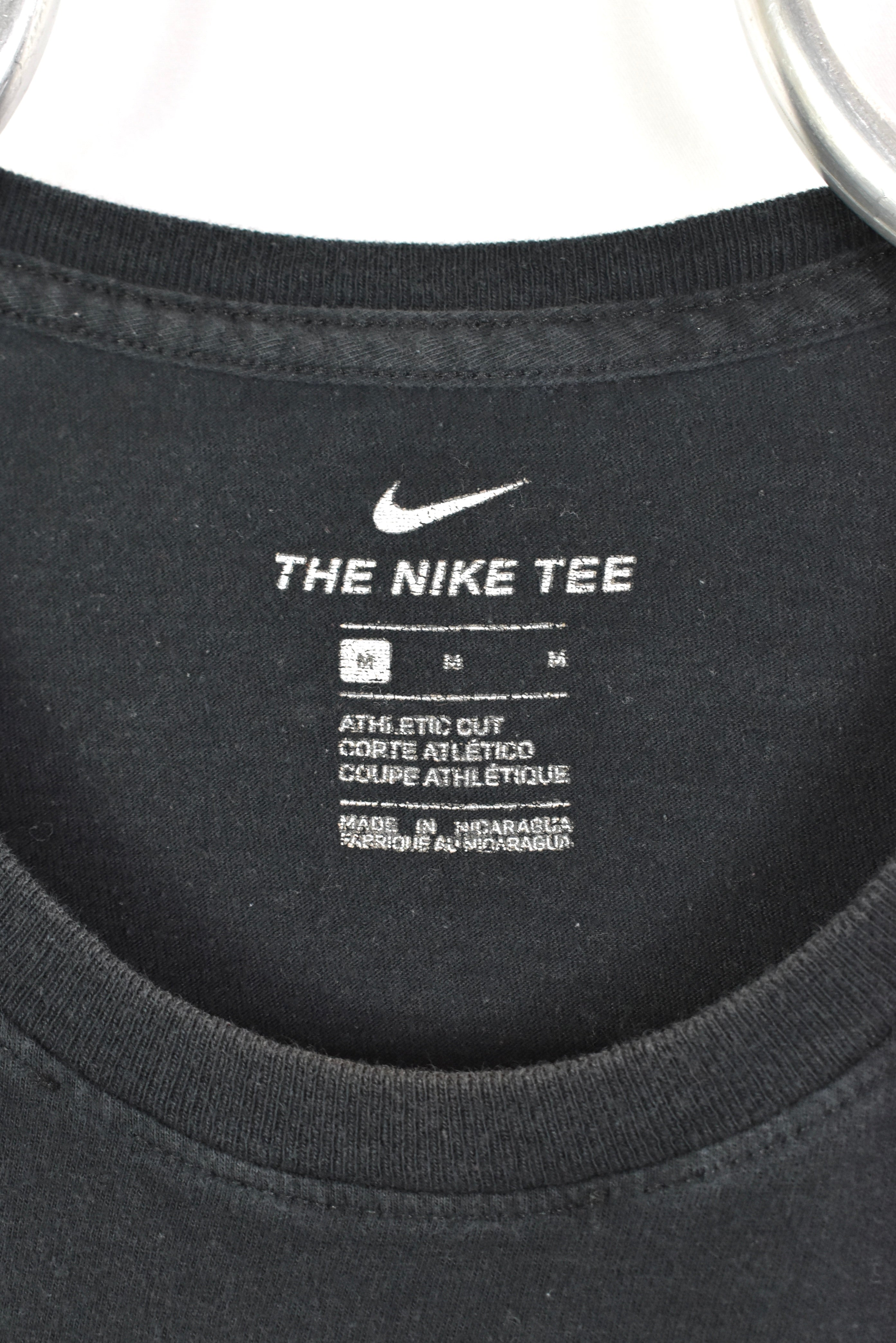 Women's modern Nike shirt, short sleeve black graphic tee - medium NIKE